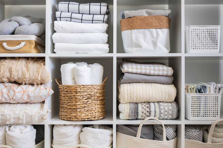 Linens and things in organized baskets and cubbies