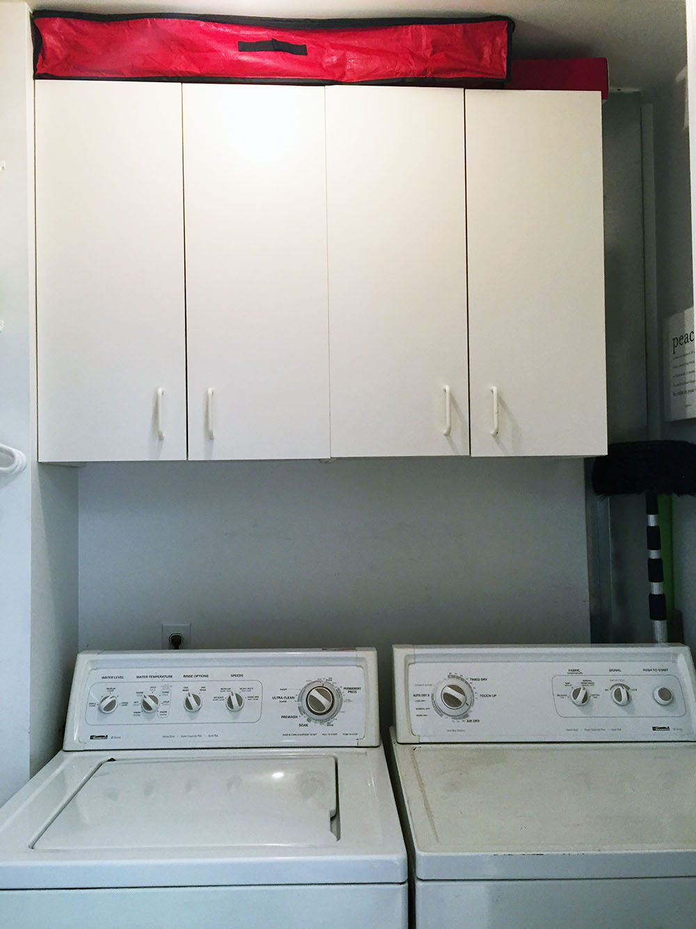 organizing starts with the cabinets above the washer