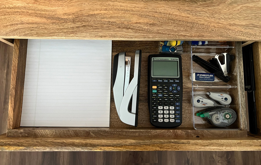 Tidy desk drawer items after reorganization