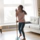Cary Prince Organizing Your Cleaning Supplies with multiracial girl dancing in living room with broom, and singing into handle as if a microphone