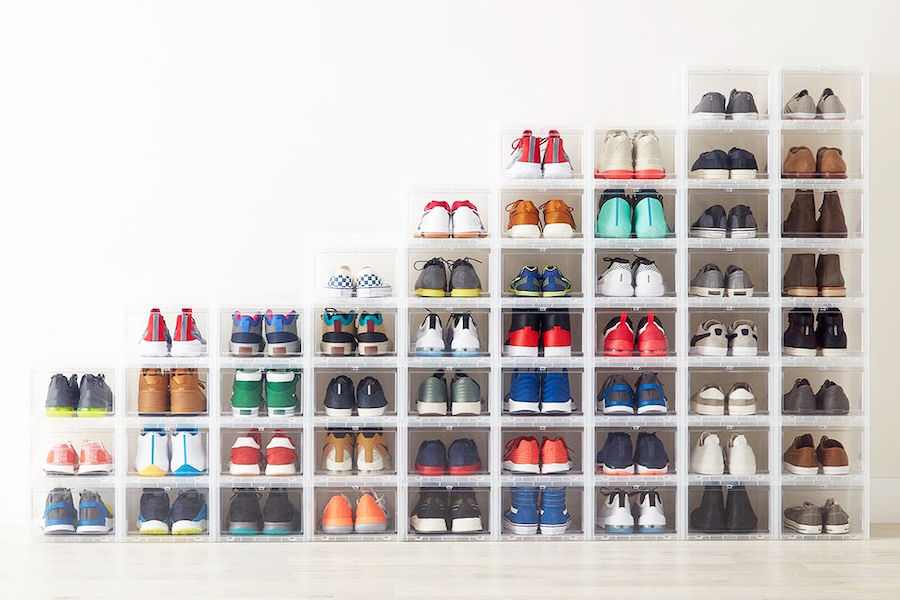 The Container Store clear acrylic Drop Front shoe storage boxes stacked in columns and rows