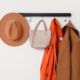 Cary Prince Organizing styles front entryway with coat hat and purse rack